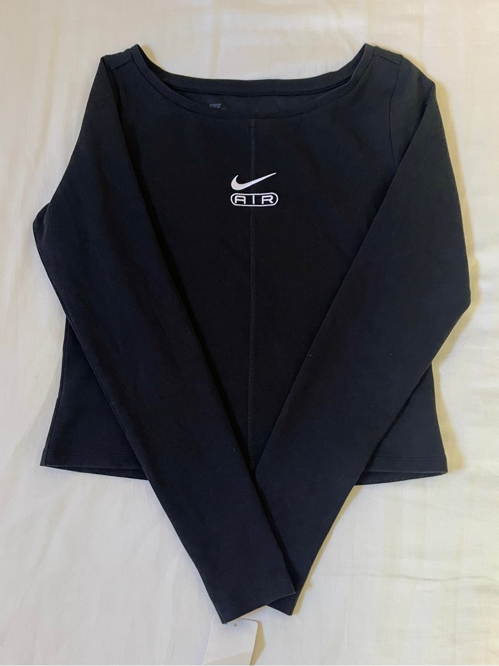 Nike Air Black Long Sleeve Crop Top with Scoop Neck & White Embroidered Logo